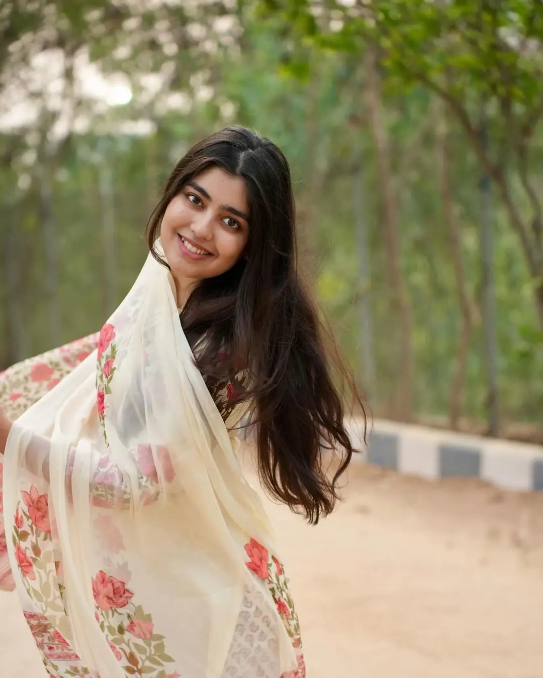 Gargeyi Yellapragada Smiling Face Long Hair White Dress